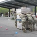Arizona National Guard members load food into local residents vehicles from local food banks.