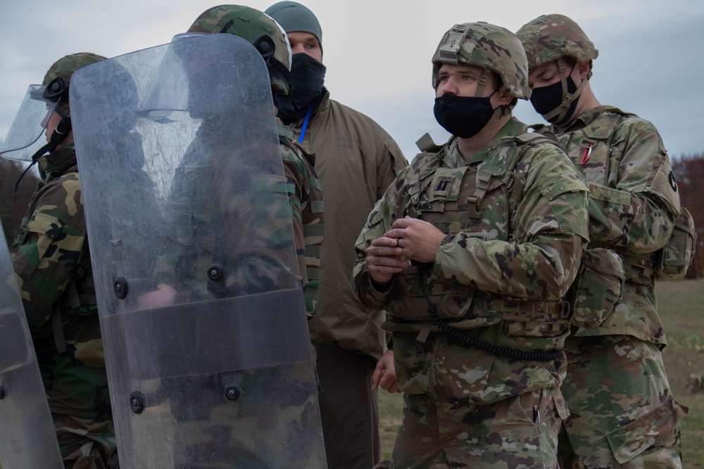 Soldier negotiates with protesters