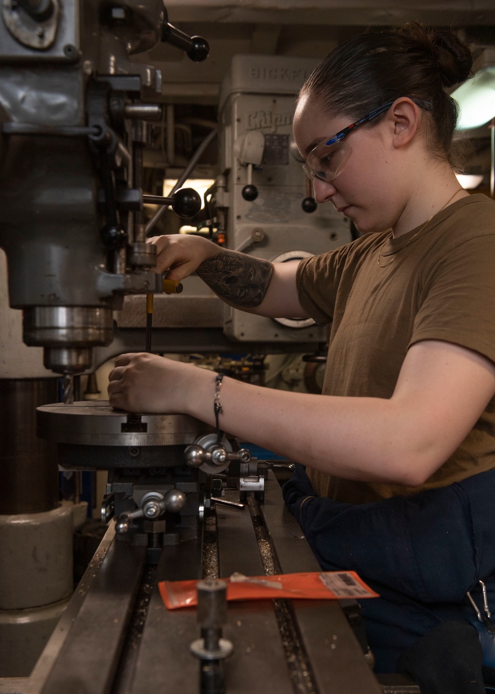 Sailor Operates Machinery