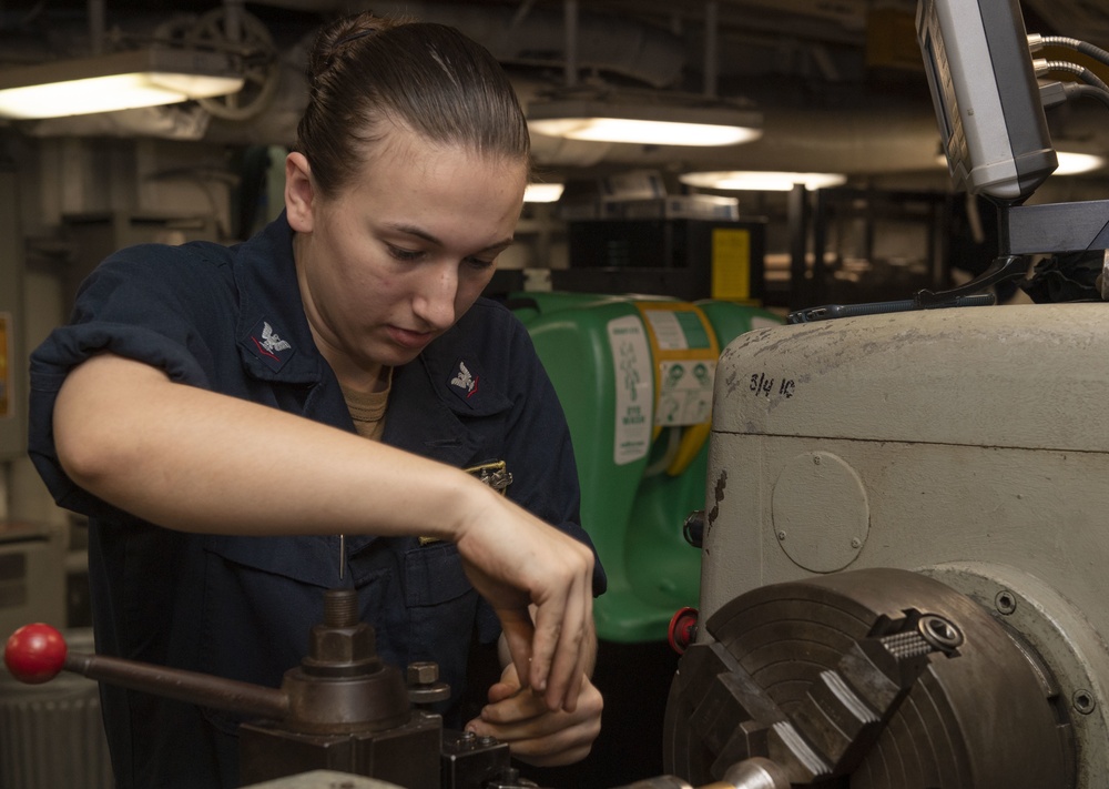 Sailor Operates Machinery