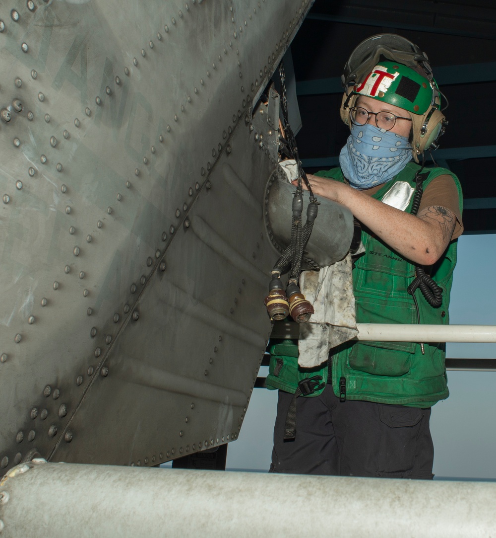 Sailor Performs Maintenance