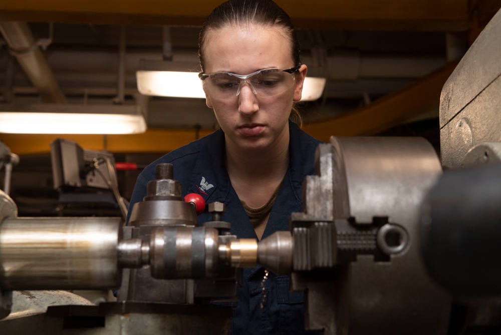 Sailor Operates Machinery