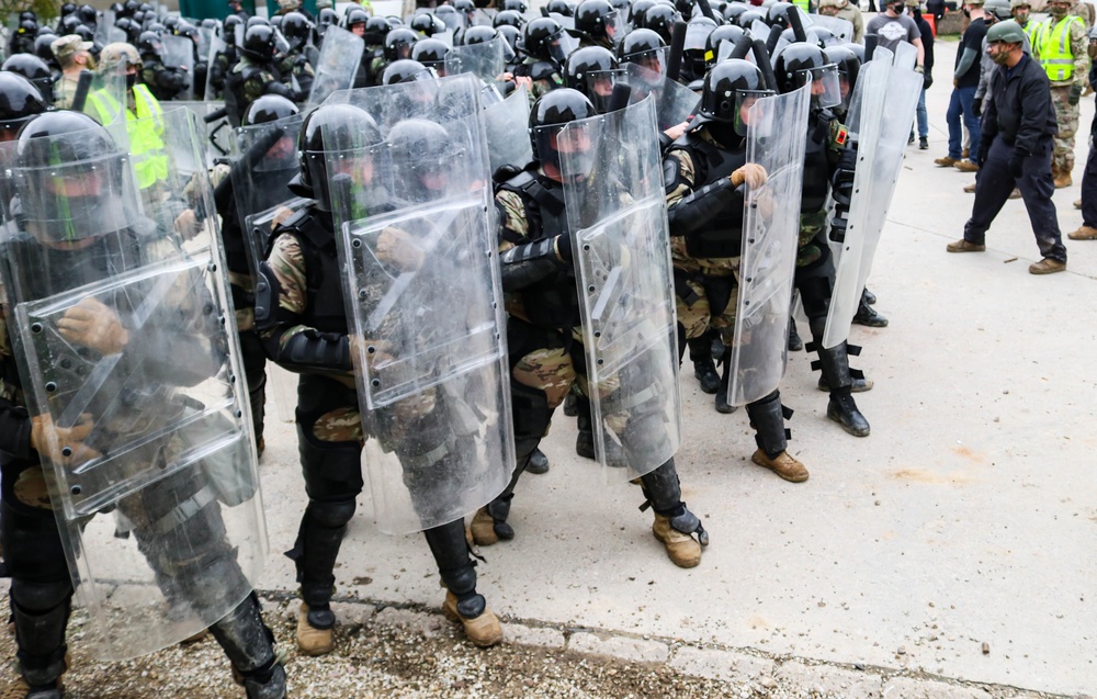 Iowa cavalry Soldiers respond to mock protest at JMRC in multinational training event