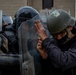 Albanian Armed Forces and simulated opposing forces collide during crowd riot control training