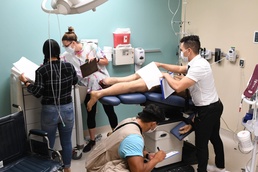 Sailors observe and record patient safety errors in the 'Room of Errors' at Branch Health Clinic (BHC) Kaneohe Bay