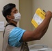 Sailor observes and records patient safety errors in the 'Room of Errors' at Branch Health Clinic (BHC) Kaneohe Bay