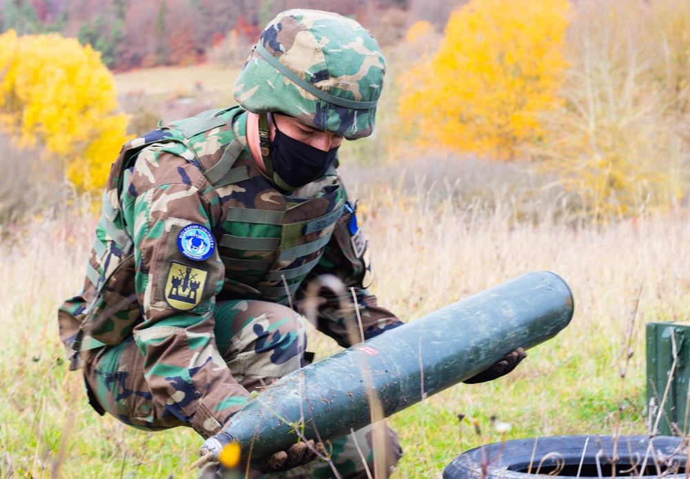 A Moldovan soldier conducts UXO training