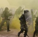 Albanians and US troops engage in mock protest