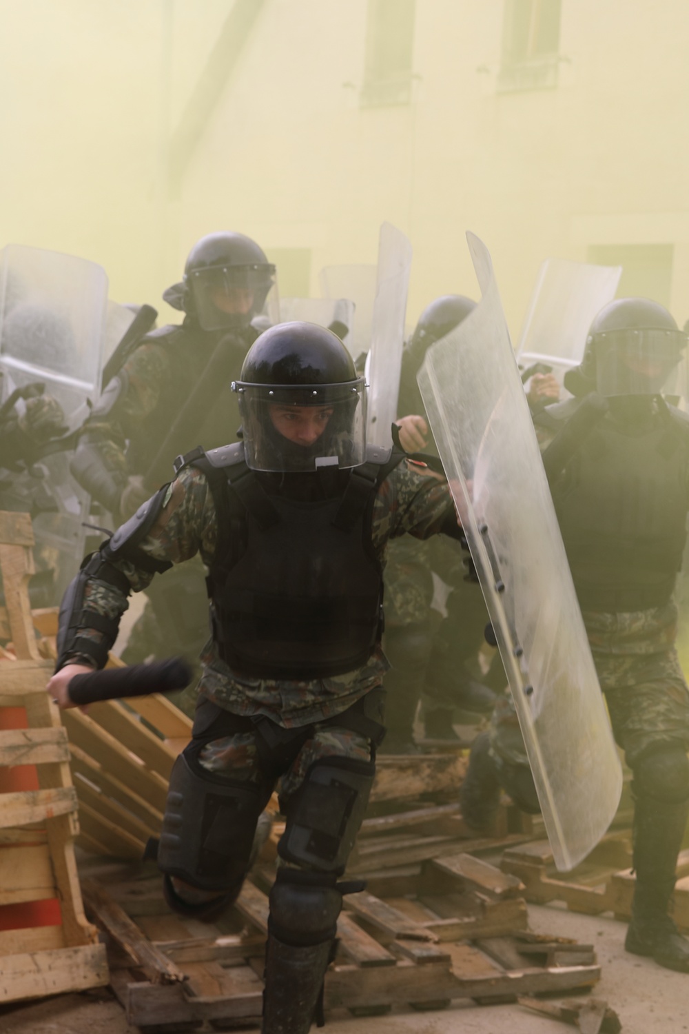 Albanians and US troops engage in mock protest