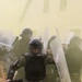 Albanians and US troops engage in mock protest
