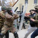 Italian and US troops engage in mock protest