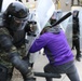 Albanians and US troops engage in mock protest