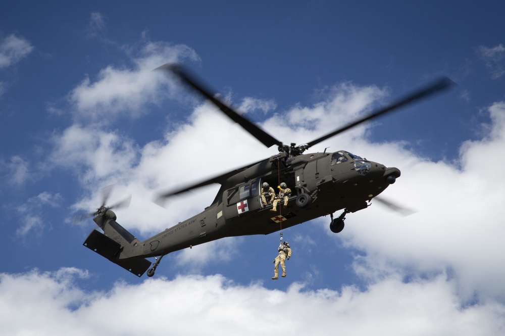USAARL's UH-60M Black Hawk helicopter performing dynamic hoist operations