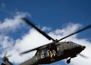 USAARL's UH-60M Black Hawk helicopter performing dynamic hoist operations