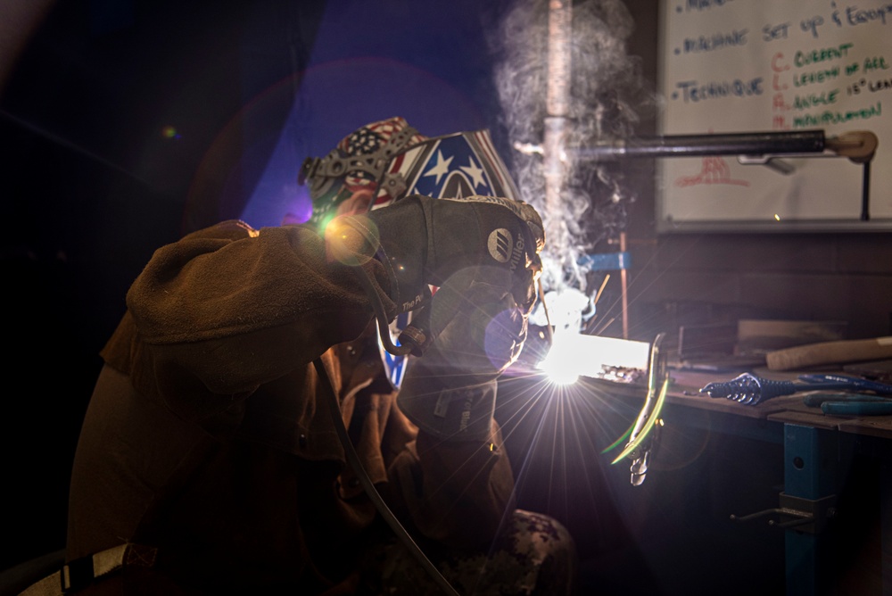 Senior Chief Petty Officer shows how its done when welding