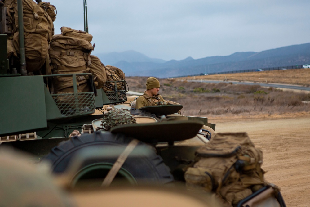 15th MEU LAR Marines refuel light armored vehicles