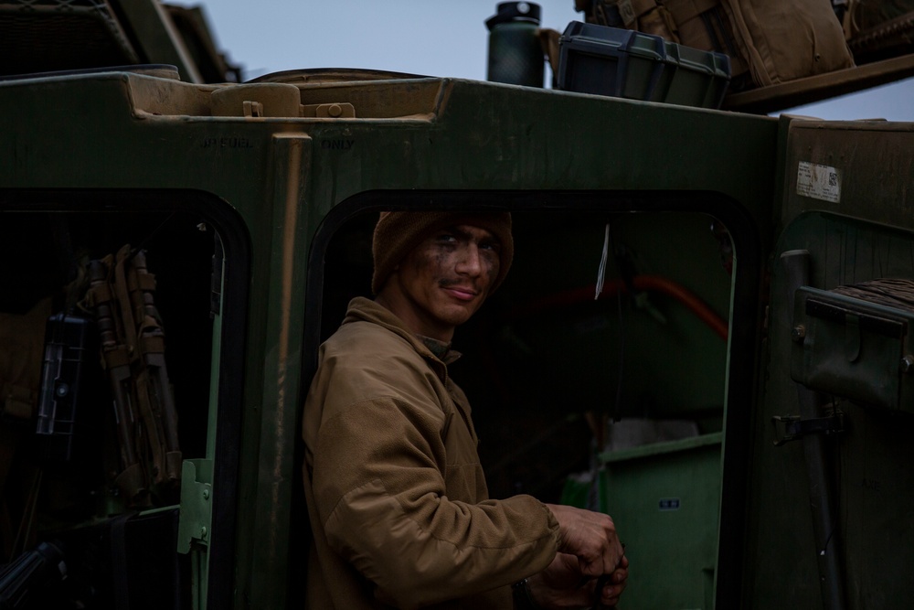 15th MEU LAR Marines refuel light armored vehicles