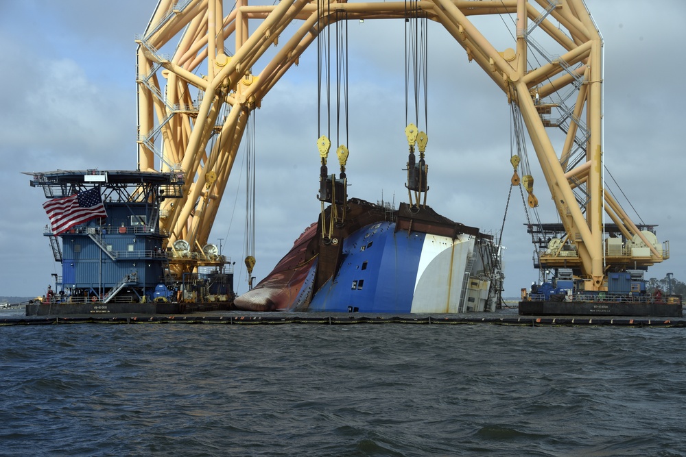 Anchor chain attached to the pulley system on the VB-10000 heavy-lift vessel moves slowly to cut through Section One of the Golden Ray wreck