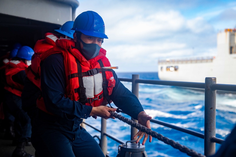 Sailor Heaves a Line During Replenishment-At-Sea