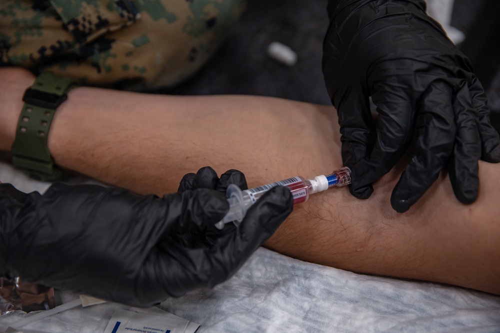 15th MEU Marines, Sailors conduct Valkyrie emergency fresh whole blood transfusion training aboard USS Somerset