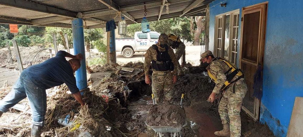 JTF-B members search debris for survivors