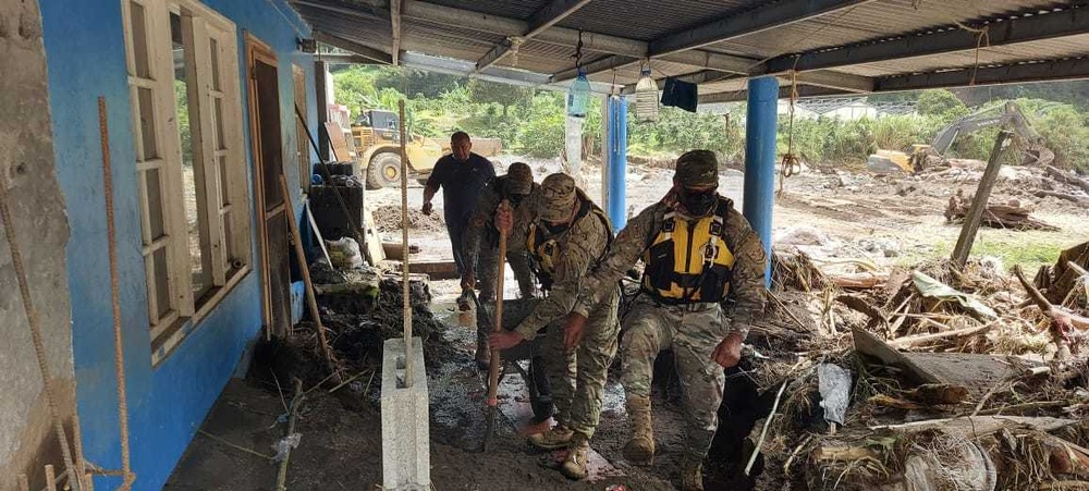 JTF-B members search debris for survivors