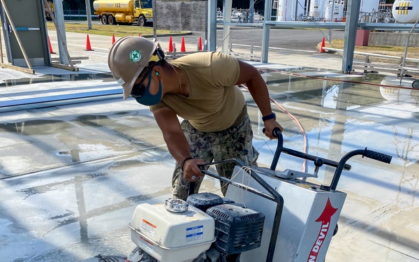 U.S. Navy Seabees continue construction of warehouse and maintenance buildings in support of NBU 7