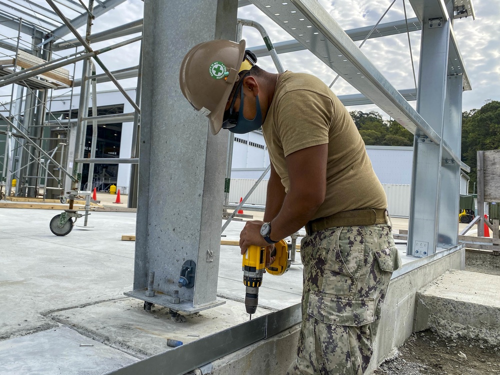 U.S. Navy Seabees continue construction of warehouse and maintenance buildings in support of NBU 7.