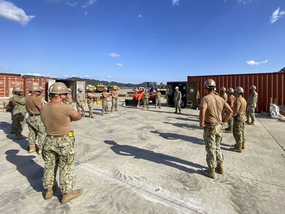 U.S. Navy Seabees continue construction of warehouse and maintenance buildings in support of NBU 7.