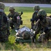 U.S. Marines and JGSDF conduct a simulated MEDEVAC on Camp Courtney