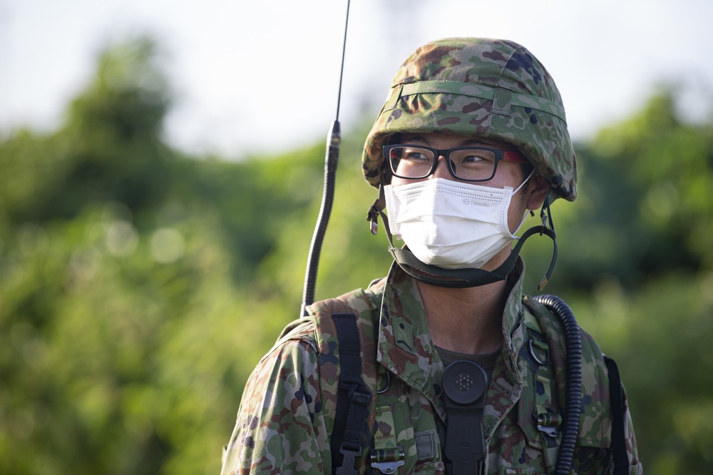 U.S. Marines and JGSDF conduct a simulated MEDEVAC on Camp Courtney