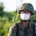 U.S. Marines and JGSDF conduct a simulated MEDEVAC on Camp Courtney