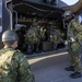 U.S. Marines and JGSDF conduct a simulated MEDEVAC on Camp Courtney