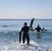 Scout swimmers survey Numazu Beach