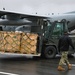 Sailors Load Cargo onto C-130