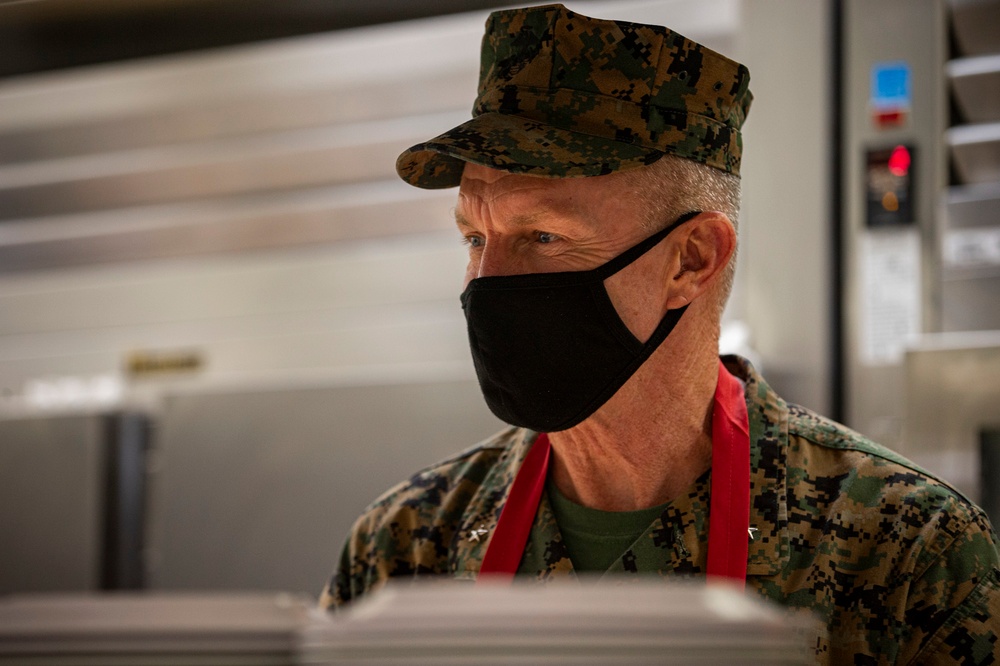 Leaders serve chow in celebration of U.S. Marine Corps 245th birthday