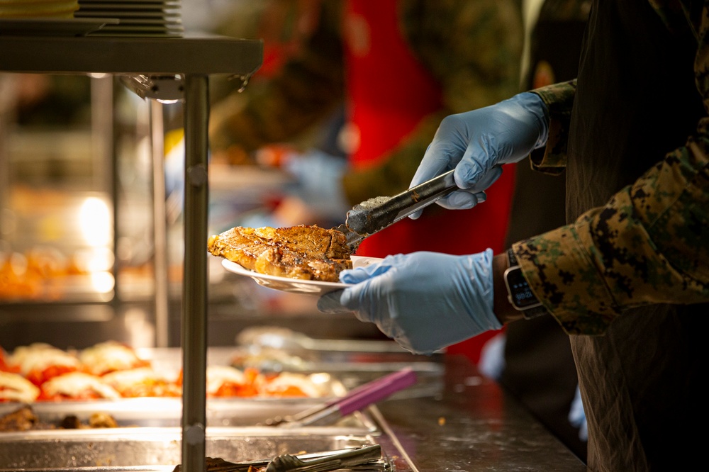 Leaders serve chow in celebration of U.S. Marine Corps 245th birthday