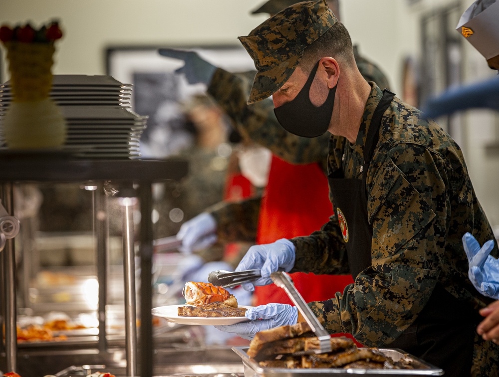 Leaders serve chow in celebration of U.S. Marine Corps 245th birthday