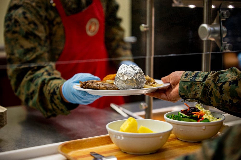 Leaders serve chow in celebration of U.S. Marine Corps 245th birthday