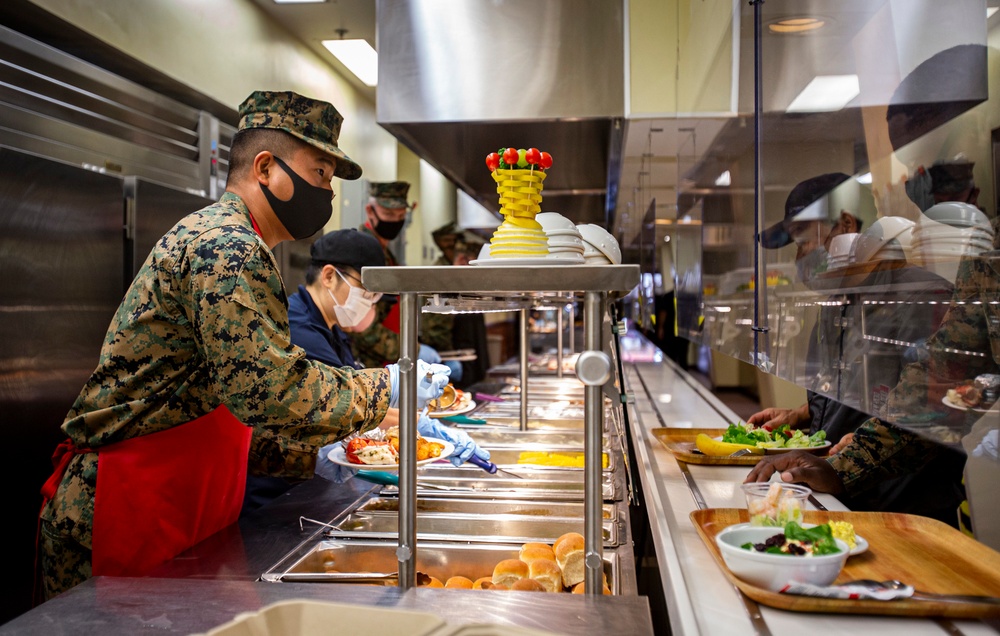 Leaders serve chow in celebration of U.S. Marine Corps 245th birthday