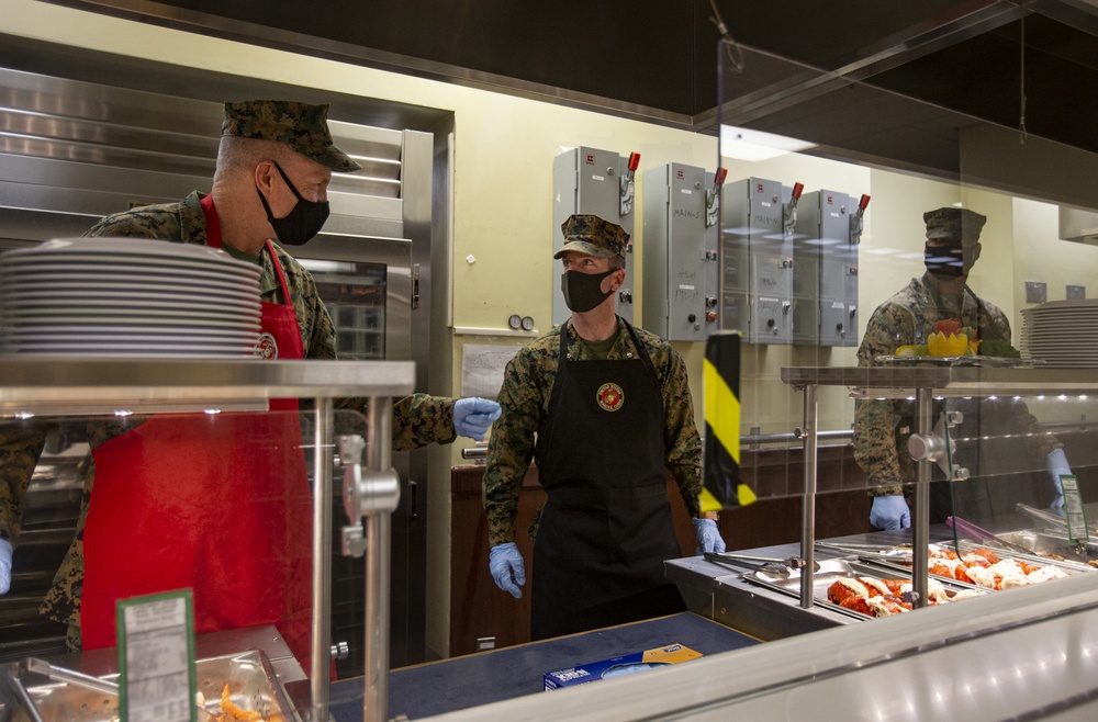 Leaders serve chow in celebration of U.S. Marine Corps 245th birthday