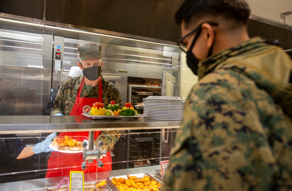 Leaders serve chow in celebration of U.S. Marine Corps 245th birthday