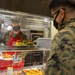 Leaders serve chow in celebration of U.S. Marine Corps 245th birthday