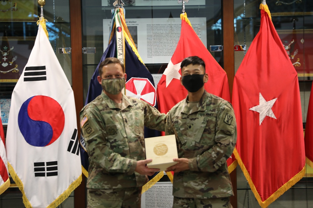 Eighth Army Command Sgt. Maj. Presents Award to Spc. Hwui Yoo for BWC