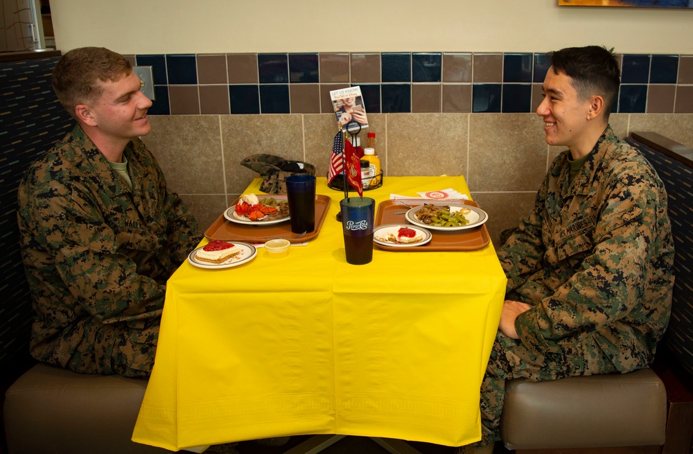 Marines with MCB Camp Lejeune celebrate the 245th Marine Corps Birthday at the French Creek 65 Mess Hall