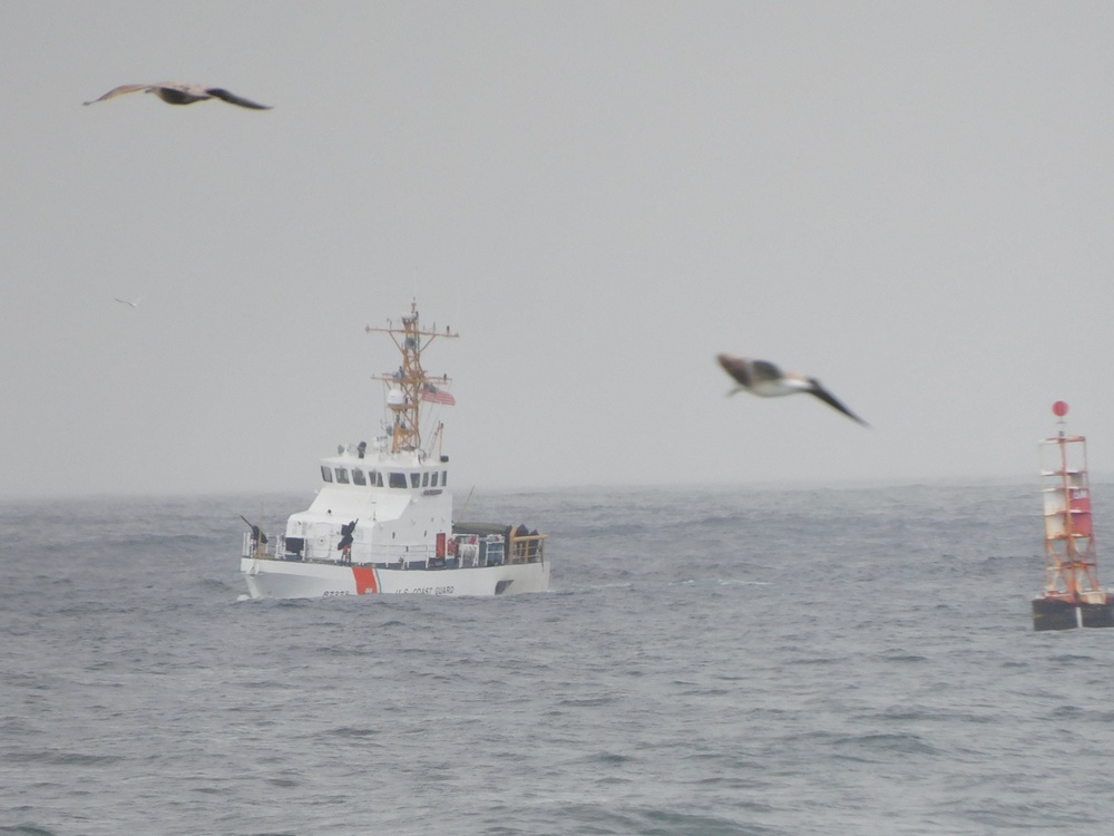 Coast Guard, partner agencies search for 2 missing from overturned vessel