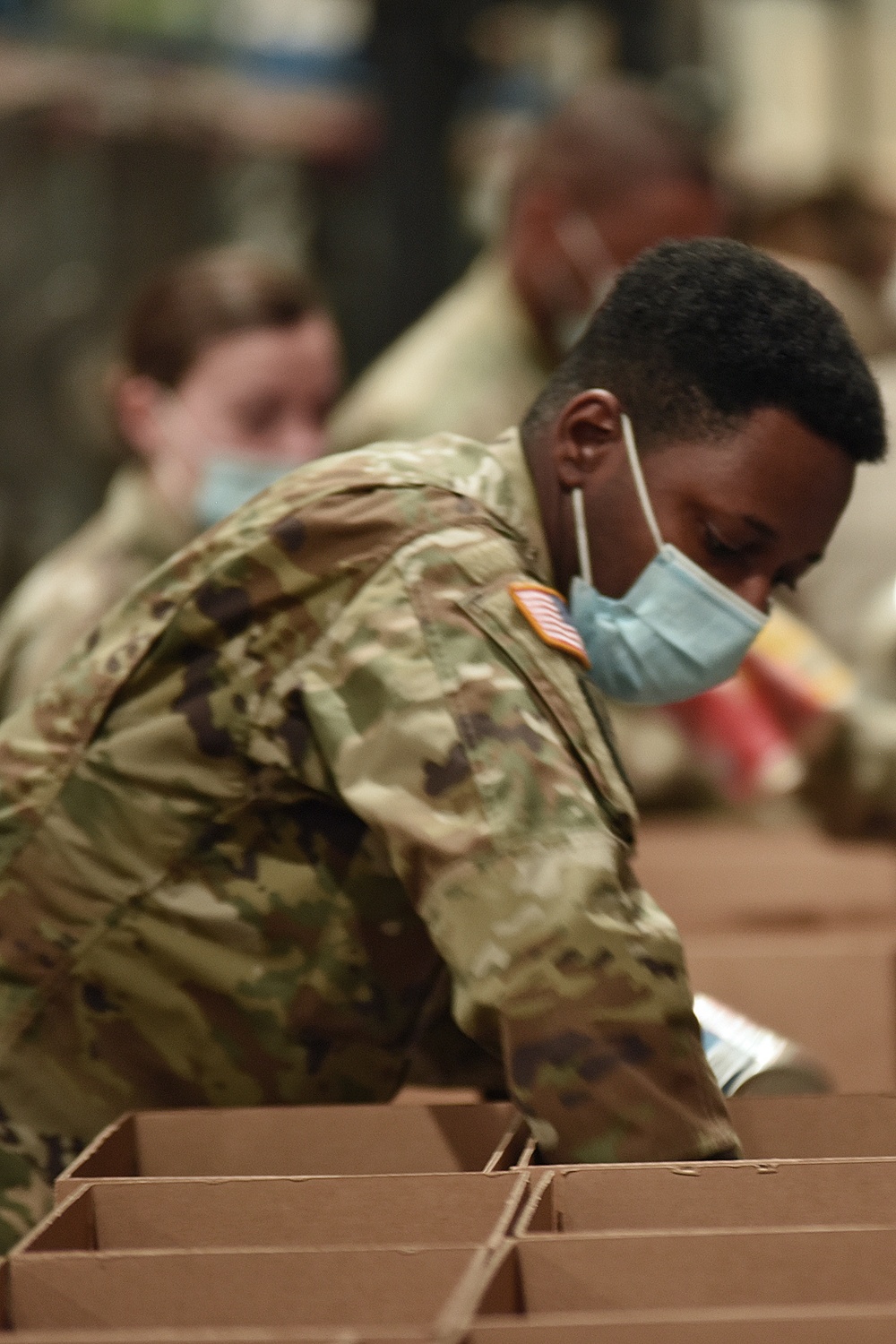 Michigan’s Task Force Spartan work with Gleaners of Warren Food Bank