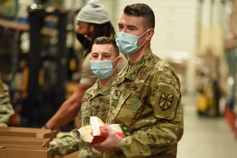 Michigan’s Task Force Spartan work with Gleaners of Warren Food Bank