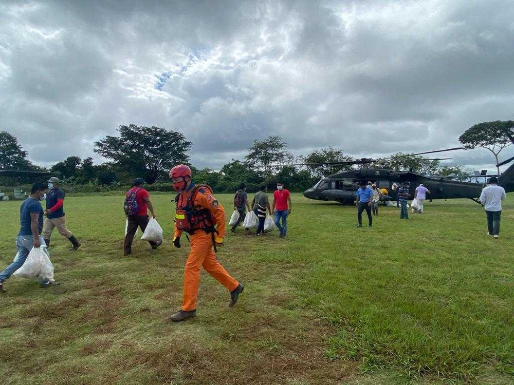 U.S. Army helicopter crew transports aid in Panama