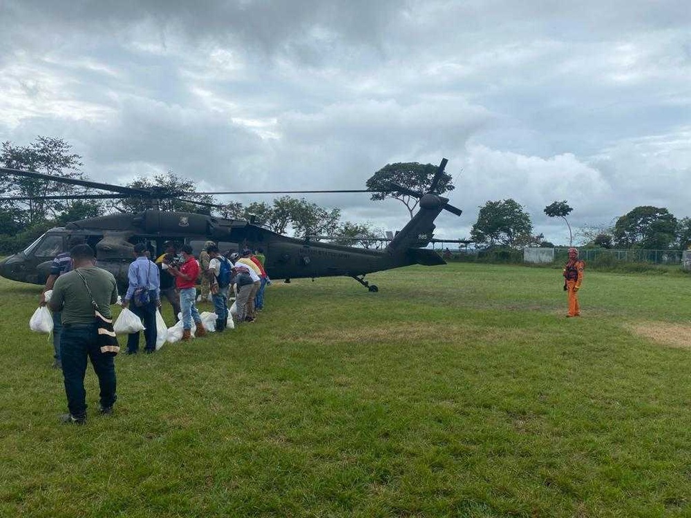 U.S. Army helicopter crew transports aid in Panama